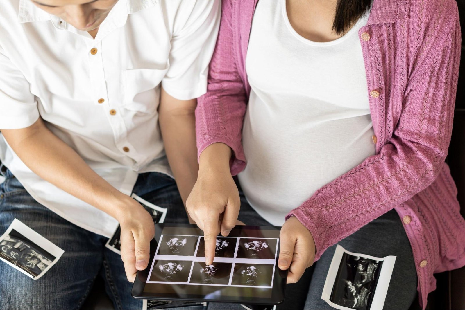 Couple discussing IVF treatment cost with doctor