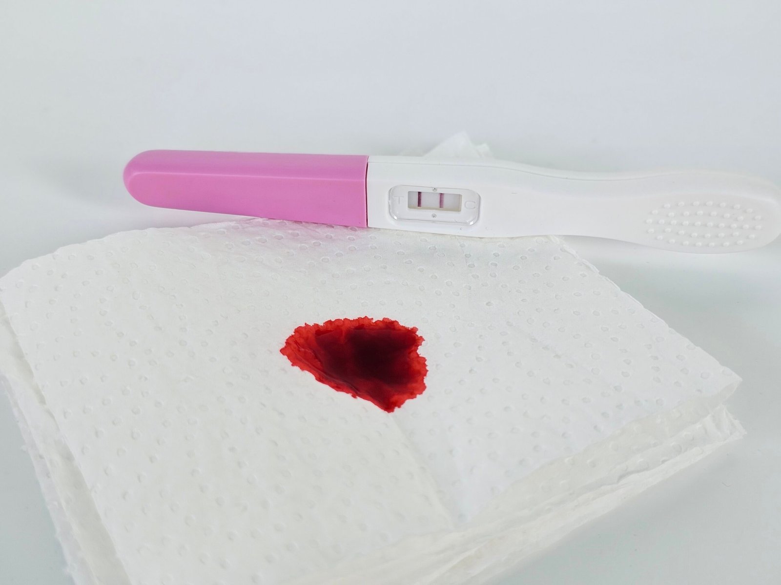 Mid-cycle bleeding and fertility
